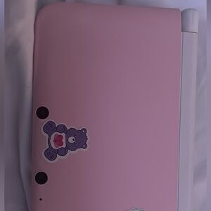 Pink ds comes with stylus and charger